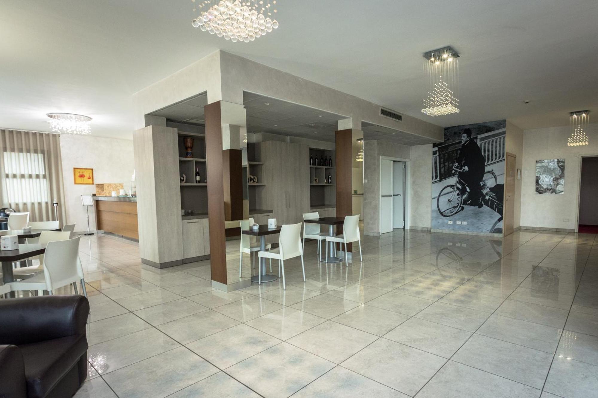 Hotel Don Camillo Брешелло Экстерьер фото